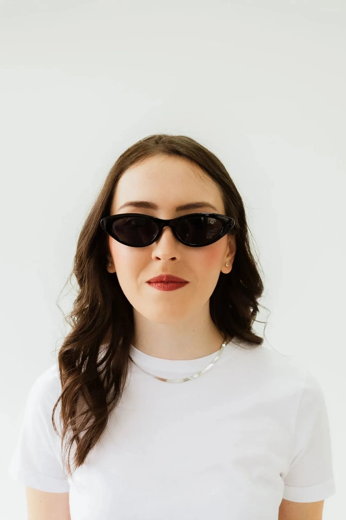 Lunettes de soleil félines noires pour femmes